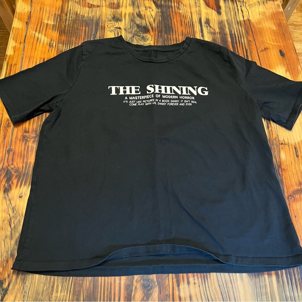 The Shining T-shirt movie images on the back. Small size